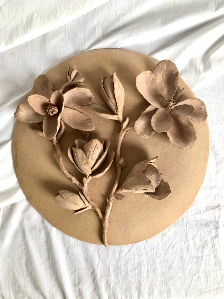 medallón de pared de sai ceramics de flor de magnolia